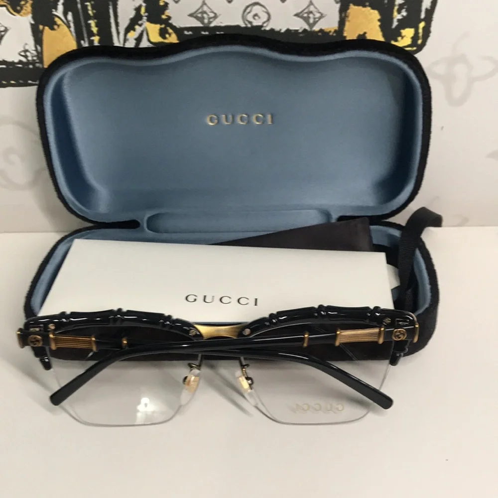 New Authentic Gucci Black and Brown Eyeglasses GG0660o 001